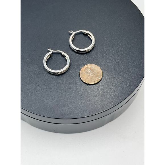 DBJ Dee Berkley 925 Sterling Silver Genuine Cut Diamond In & Out Hoop
Earrings - Picture 9 of 16